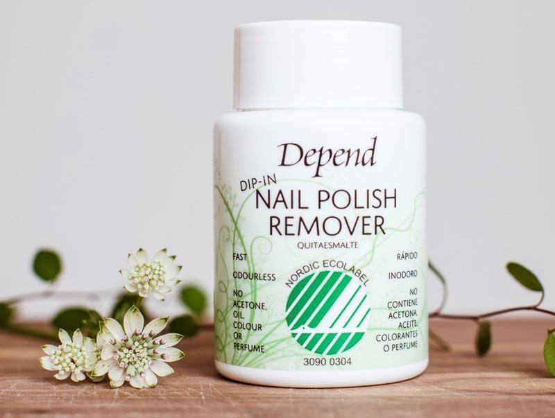 Närbild på Dip-In Nail Polish Revomer av Depend